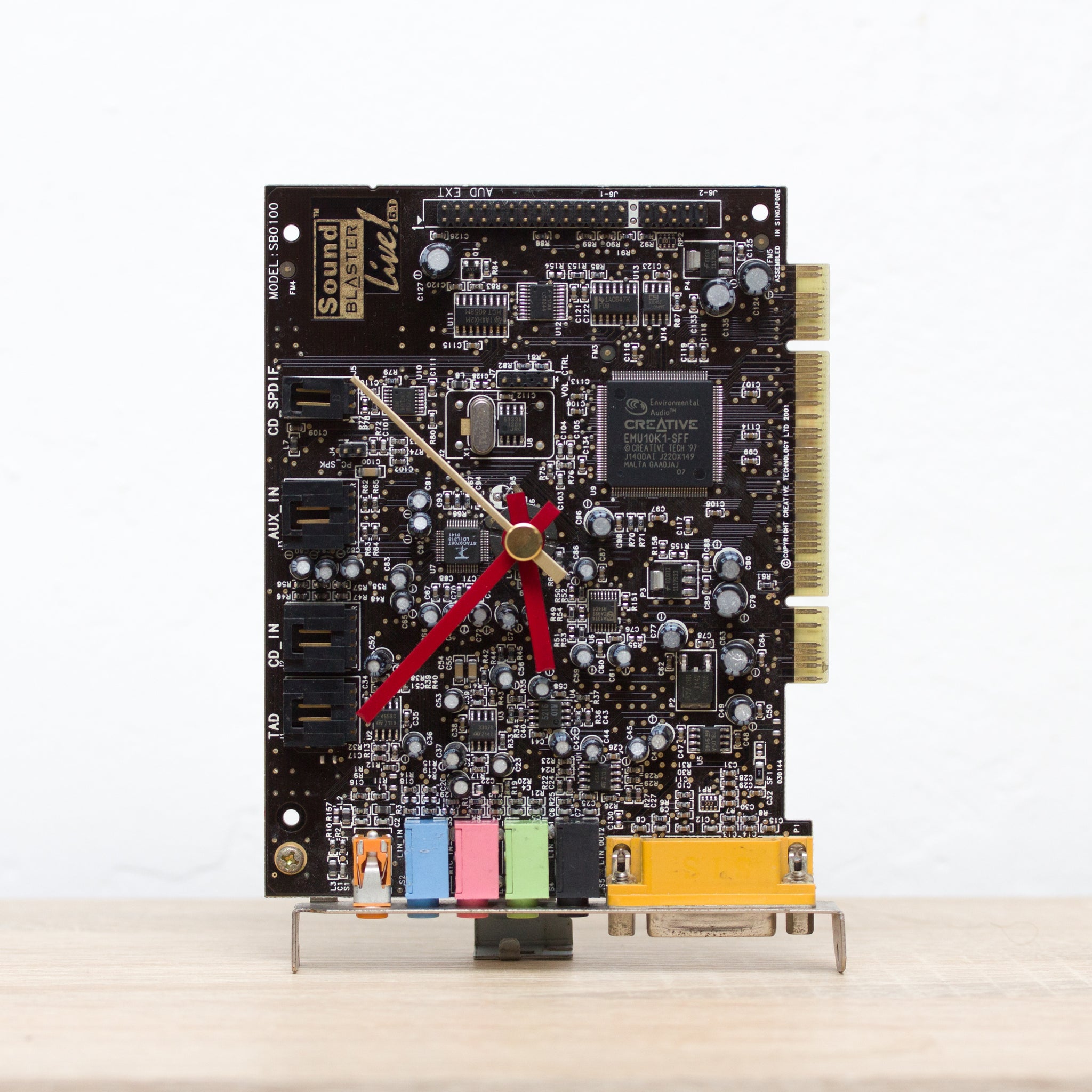 Techie Clock made of dark brown circuit board
