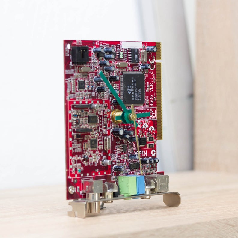 Techie Clock made of red circuit board